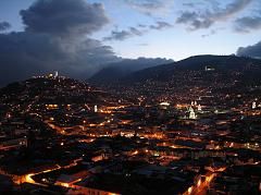 
We had dinner at Cafe Mosaico in an old house high up on a hill overlooking Old Quito. The view from Cafe Mosaico is excellent. Here is a view of Old Quito and El Panecillo just after dusk as the lights came on.

